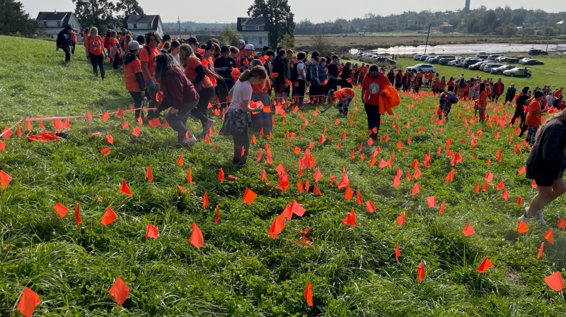  Orange flags are placed in the ground where Shubenacadie Residential School once stood to make Truth and Reconciliation Day. (CTV Atlantic) 