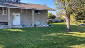 Hanmer home on MR80 was damaged after being struck by a vehicle driven by a 73-year-old man who suffered a medical emergency behind the wheel. Sept. 29/23 (Alana Everson/CTV Northern Ontario)