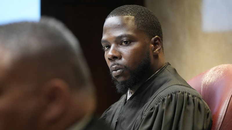 Oakland County Judge Kwame Rowe looks towards witness during cross examination, July 27, 2023, in Pontiac, Mich. The teenager who killed four students at Michigan’s Oxford High School will learn whether he will spend his life in prison or get a chance for parole in the decades ahead. Judge Rowe will announce his decision Friday, Sept. 29. (AP Photo/Carlos Osorio, File)
