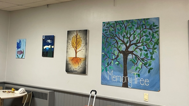 A memorial painting at the Royal City Mission. Community members were invited to add a leaf with the name of someone they know who had passed due to drug poisoning. (Hannah Schmidt/CTV Kitchener) 