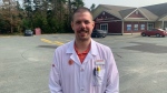 Joshua Ghriginghelli in front of a pharmacy in Hubbards, N.S. (CTV/Heidi Petracek)
