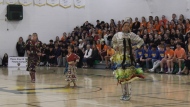 Jingle dancers perform for student athletes ahead of the Reconciliation in Sport volleyball tournament at Campbell Collegiate on Sept. 30, 2023. (Katy Syrota / CTV News) 