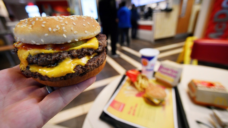 A McDonald's Double Quarter Pounder is shown with the new fresh beef Tuesday, March 6, 2018, in Atlanta. (AP Photo/Mike Stewart)