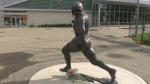 George Reed's statue outside of Mosaic Stadium. (Brit Dort/CTV News)