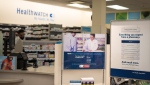 Signage explaining that Ontario pharmacists are able to provide prescriptions for minor health conditions is photographed at a Shoppers Drug Mart pharmacy in Etobicoke, Ont., on January 11, 2023. THE CANADIAN PRESS/ Tijana Martin