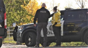 Calgary police search a property east of the city off Range Road 281 on Tuesday, Oct. 3, 2023. 