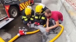 Firefighters in Ukraine save unconscious dog 