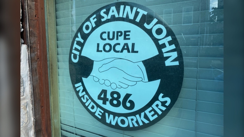 The logo for CUPE Local 486 is displayed on a window on Oct. 3, 2023.