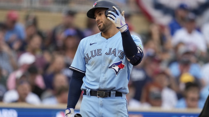 Toronto Blue Jays' George Springer reacts after fouling out during the third inning in Game 1 of an AL wild-card baseball playoff series against the Minnesota Twins Tuesday, Oct. 3, 2023, in Minneapolis. (AP Photo/Abbie Parr)
