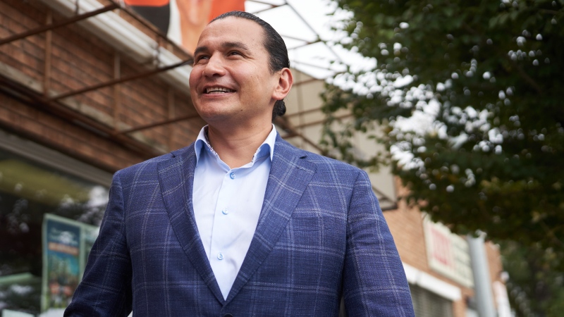 Manitoba NDP leader Wab Kinew greets candidates and supporters at the St. Boniface campaign office on provincial election day in Winnipeg, Man., Tuesday, October 3, 2023. THE CANADIAN PRESS/David Lipnowski