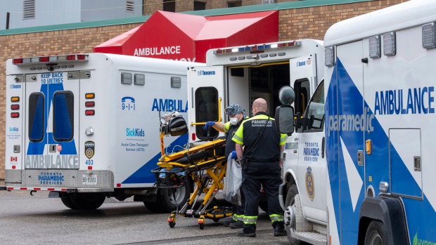 Ambulances spill out onto the road as they try to navigate the Emergency Department at Sunnybrook Hospital in Toronto on Tuesday May 4, 2021. THE CANADIAN PRESS/Frank Gunn