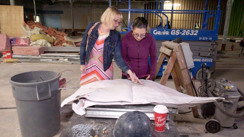 Roxy Janzen and Theresa Tucci look over plans for their new roller skating facility called House of Skate that's set to open at the end of 2023.