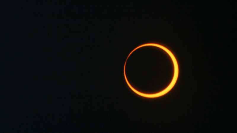 An annular solar eclipse happens when the Moon passes between the Sun and Earth while it is at its farthest point from Earth. Because the Moon is farther away from Earth, it appears smaller than the Sun and does not completely cover the star. This creates a “ring of fire” effect in the sky. (NASA/Bill Dunford)
