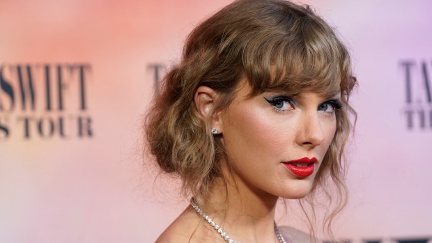 Taylor Swift arrives at the world premiere of the concert film "Taylor Swift: The Eras Tour" on Wednesday, Oct. 11, 2023, at AMC The Grove 14 in Los Angeles. (AP Photo/Chris Pizzello)
