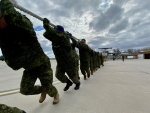 A team takes part in the Herc and Dash-8 Plane Pull on Oct. 13, 2023. (Image source: Scott Andersson/CTV News Winnipeg)