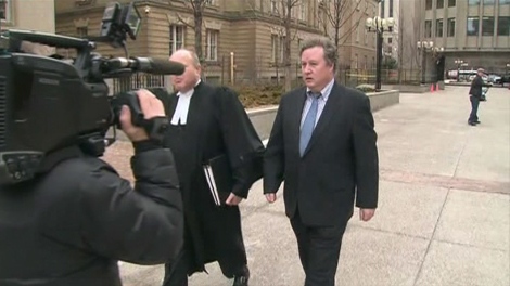 Steve Ellis (right) is walking with lawyer John Rosen on Monday, Feb. 22, 2010.