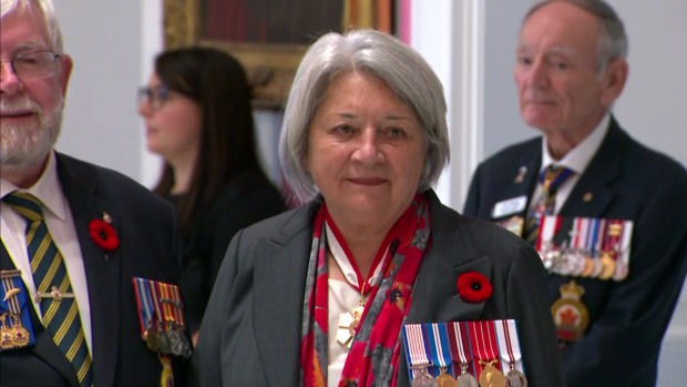 Governor General Mary Simon (right) receives first poppy of the National Poppy Campaign at Rideau Hall on Friday, Oct. 20, 2023. 