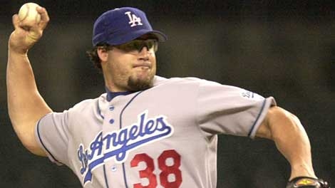 Los Angeles Dodgers closer Eric Gagne throws against the Detroit Tigers in the 12th inning in Detroit, Tuesday, June 10, 2003. Gagne got his 22nd save in 22 opportunities in the Dodgers' 3-1 win. (AP Photo/Paul Sancya) 