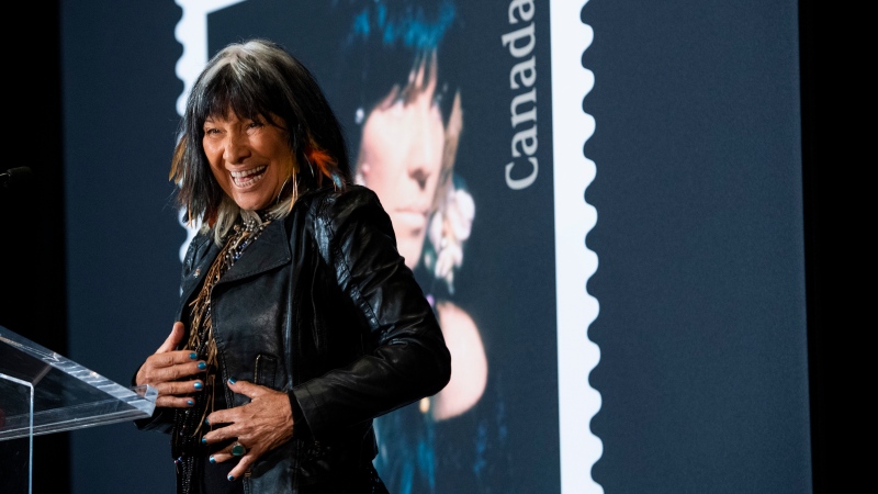 Buffy Sainte-Marie speaks after the unveiling of a Canada Post stamp honouring her legacy as a singer-songwriter, in Ottawa, on Thursday, Nov. 18, 2021. THE CANADIAN PRESS/Justin Tang