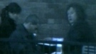 A scene from the video shot Sept. 26, 2006 purportedly showing refugee claimant Ji-Hye Kim (left) at a downtown coffee shop with then-immigration judge Steve Ellis (right).