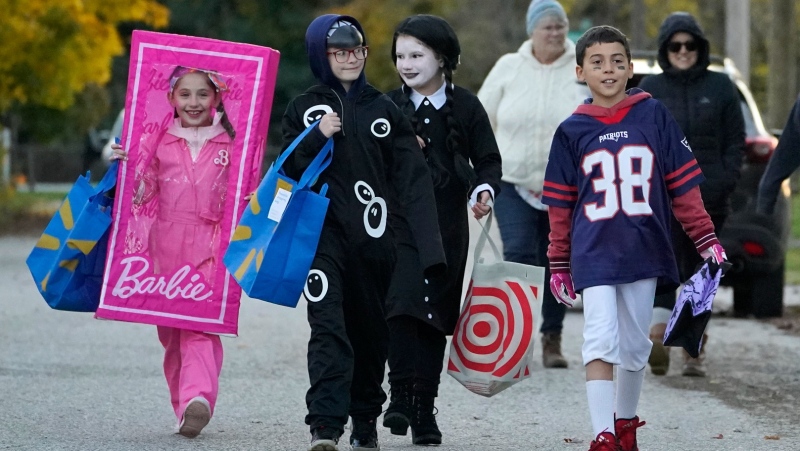 Kids return to school, plan to trick-or-treat as Maine community starts to heal from mass shooting