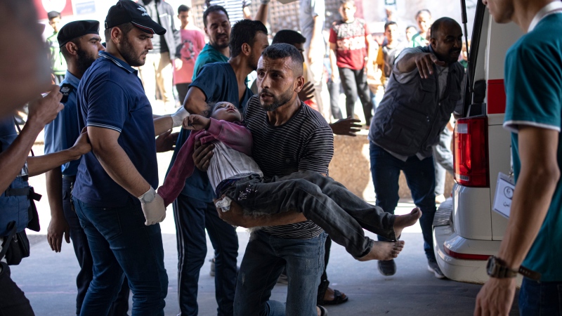 A Palestinian wounded in Israeli bombardment of the Gaza Strip is brought to a hospital in Khan Younis, Sunday, Nov. 6, 2023. (AP Photo/Fatima Shbair) 
