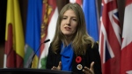 NDP MP for Victoria Laurel Collins speaks about intimate partner violence during a news conference, Thursday, Nov. 9, 2023 in Ottawa. (THE CANADIAN PRESS/Adrian Wyld)