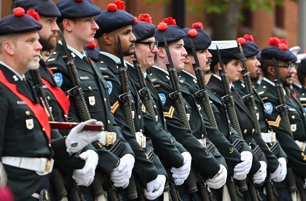 Members of the Canadian Armed Forces stand to attention during a Remembrance Day ceremony in Montreal, Saturday, November 11, 2023. THE CANADIAN PRESS/Graham Hughes
