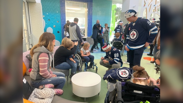 Members of the Winnipeg Jets visit the Rehabilitation Centre for Children on Nov. 15, 2023. All photos by Jamie Dowsett.