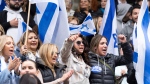 People attend a rally in support of Israel in Montreal, Tuesday, Oct. 10, 2023. THE CANADIAN PRESS/Christinne Muschi