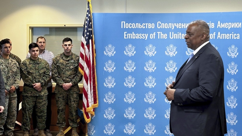 U.S. Secretary of Defense Lloyd Austin, right, speaks to employees of the U.S. embassy in Kyiv, Monday, Nov. 20, 2023, during his visit to Ukraine. (W.G. Dunlop/Pool via AP)