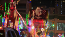 Santa Claus waves to the crowd during the Santa Claus Parade on Nov. 18, 2023. 