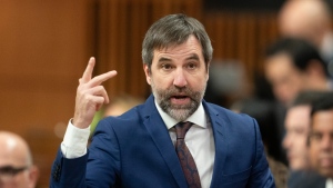 Minister of Environment and Climate Change Steven Guilbeault rises during question period in the House of Commons, in Ottawa, Tuesday, Nov. 21, 2023. THE CANADIAN PRESS/Adrian Wyld