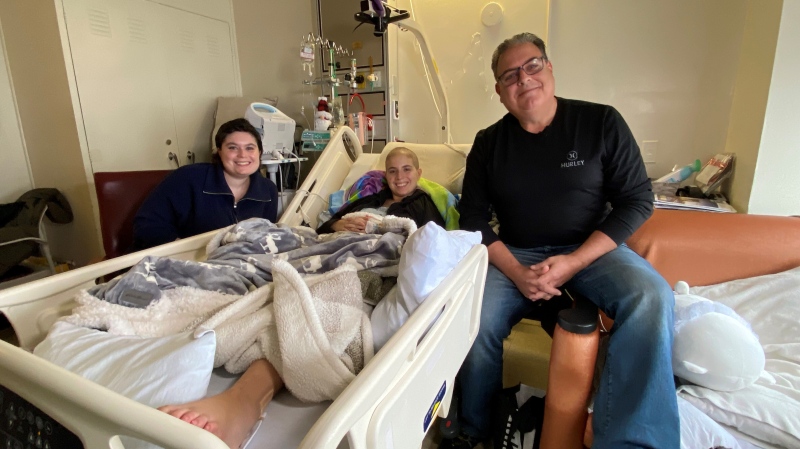 Christopher Harding with his daughters Cassandra, 20, and Katelyn, 18, as his younger girl goes through treatment for the rare form of cancer that Terry Fox had: osteosarcoma. (Christine Long/CTV News)