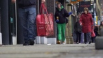 Warm weather helps holiday shoppers