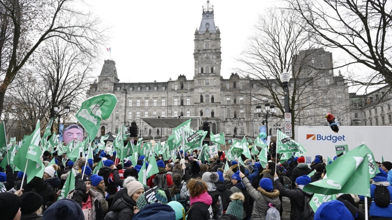 Four large Quebec public sector unions say they will strike for a week in December in an effort to increase the pace of contract negotiations with the provincial government. Thousands of members of the unions' common front gathered to protest, Thursday, Nov. 23, 2023, at the National Assembly in Quebec City. THE CANADIAN PRESS/Jacques Boissinot
