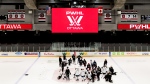 A general view as Carla MacLeod, Head Coach of the Professional Women's Hockey League (PWHL) Ottawa team speaks to players during training camp at TD Place in Ottawa, Friday, Nov. 17, 2023. (Spencer Colby/THE CANADIAN PRESS)
