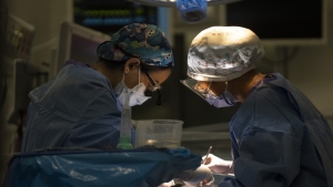 An Ontario-based study published today suggests patients treated by female surgeons incur lower health-care costs than those with male surgeons. A surgery is performed in the operating room in Toronto's Hospital for Sick Children on Wednesday, November 30, 2022. THE CANADIAN PRESS/Chris Young