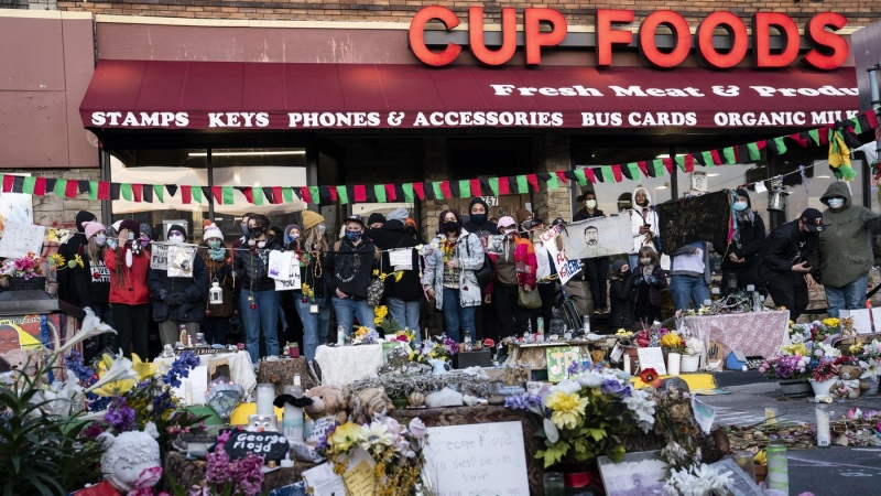 Demonstrators gather outside Cup Foods to celebrate the murder conviction of former Minneapolis police officer Derek Chauvin in the killing of George Floyd, April 20, 2021, in Minneapolis.  (AP Photo/John Minchillo, File)