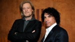 Daryl Hall, left, and John Oates, recipients of BMI Icons awards, pose together before the 56th annual BMI Pop Awards in Beverly Hills, Calif., on May 20, 2008. Hall has sued his longtime music partner John Oates, arguing that his plan to sell off his share of a joint venture would violate a business agreement the duo had.(AP Photo/Chris Pizzello, File)