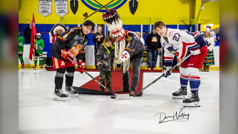 A ceremonial face-off was held to celebrate the first AJHL regular-season game played at Deerfoot Sportsplex at Siksika Nation Wednesday night. (Photo: X@Brooks_Bandits/DaveWatling)