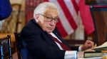 Former U.S. secretary of state Henry Kissinger attends a luncheon with French President Emmanuel Macron, Vice President Kamala Harris and Secretary of State Antony Blinken, Thursday, Dec. 1, 2022, at the State Department in Washington. (AP Photo/Jacquelyn Martin, File) 
