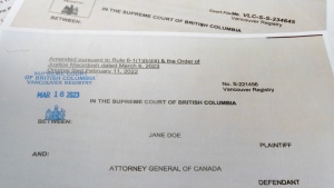 Lawsuits filed in British Columbia by two Canadian Security Intelligence Service surveillance officers are seen in this photograph. The anonymized lawsuits by officers identified as "Jane Doe" and "A.B." describe alleged sexual assaults, harassment and other wrongdoing in the B.C. office of Canada's spy agency. The women, who are on leave from the service, are forbidden by law from identifying themselves or other covert officers. THE CANADIAN PRESS/Graeme Roy