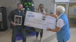 Jo-Ann and Chad Nicolle win a record-setting RVH Auxiliary 50/50 draw in Barrie, Ont. (CTV News/Dana Roberts)