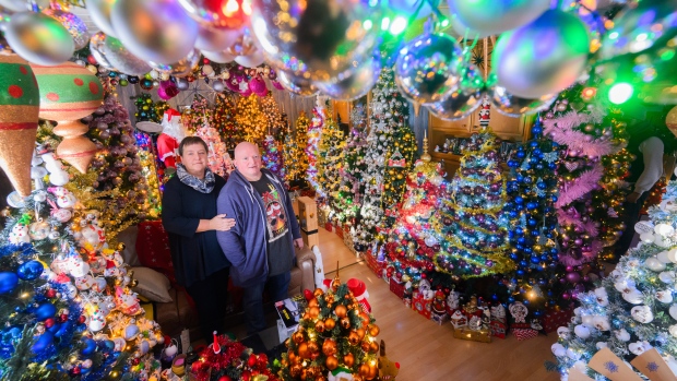 An modest house in Germany hides a bright and joyful secret. Inside Susanne and Thomas Jeromin’s family home are 555 decorated Christmas trees in different shapes, sizes and colors - the most decorated trees in one house in the world, according to the German Institute of Records. (Photo by Julian Stratenschulte/picture alliance via Getty Images)