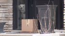 A package is delivered to a porch in Barrie, Ont. (CTV News/Mike Arsalides)