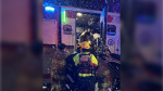 Ottawa firefighters load a man who had fallen into the Rideau Canal into a fire truck to keep warm after he was pulled from the water. Dec. 2, 2023. (Ottawa Fire Services)