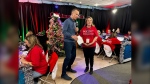 Paul Hollingsworth speaks with Christmas Daddies volunteer on camera. (CTV/Suzette Belliveau) 