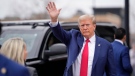 Former U.S. president Donald Trump waves to a crowd as he leaves a Commit to Caucus rally, Saturday, Dec. 2, 2023, in Ankeny, Iowa. (AP Photo/Matthew Putney)