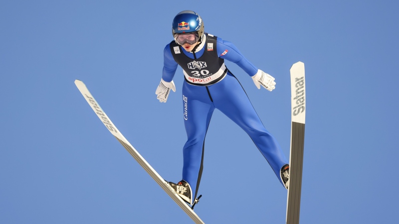 Alexandria Loutitt from Canada soars through the air during the ski jumping portion of the women's World Cup combined, in Lillehammer, Norway, Saturday, Dec. 2, 2023. (Geir Olsen/NTB Scanpix via AP)
